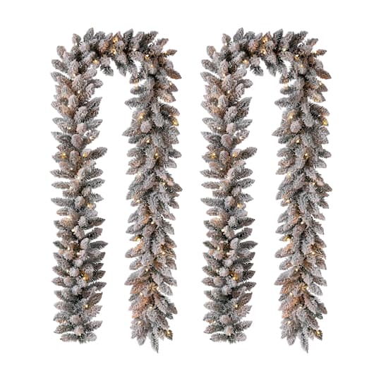 Glitzhome® 9Ft LED Snow Flocked Christmas Garlands with Timer, 2ct. in White | 9 ft | Michaels®
